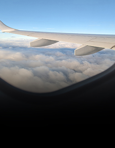 Sky view looking outside an airplane window